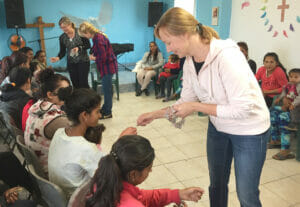 2020 4 Paivi gives bracelet to mother