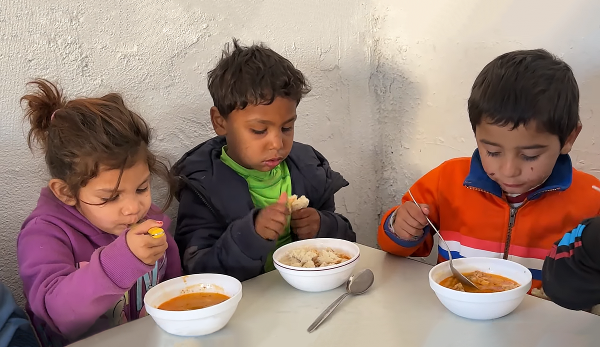 Pepi at soup kitchen TALLER