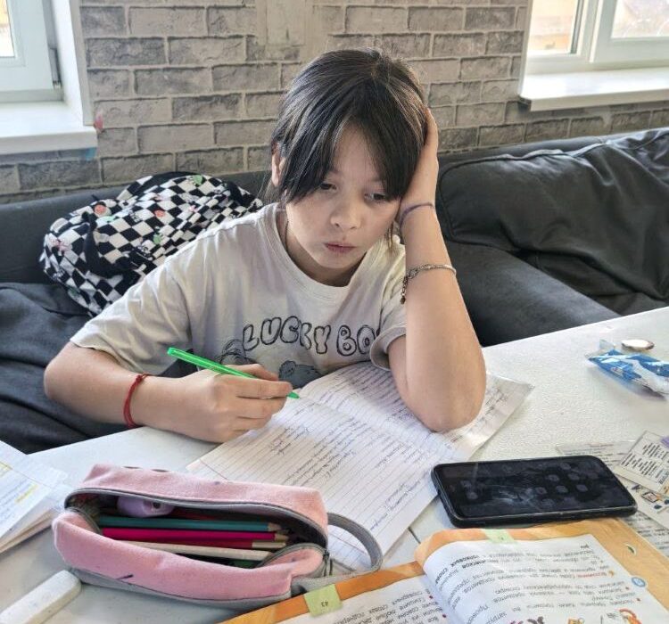 Anya writing e1774954141622