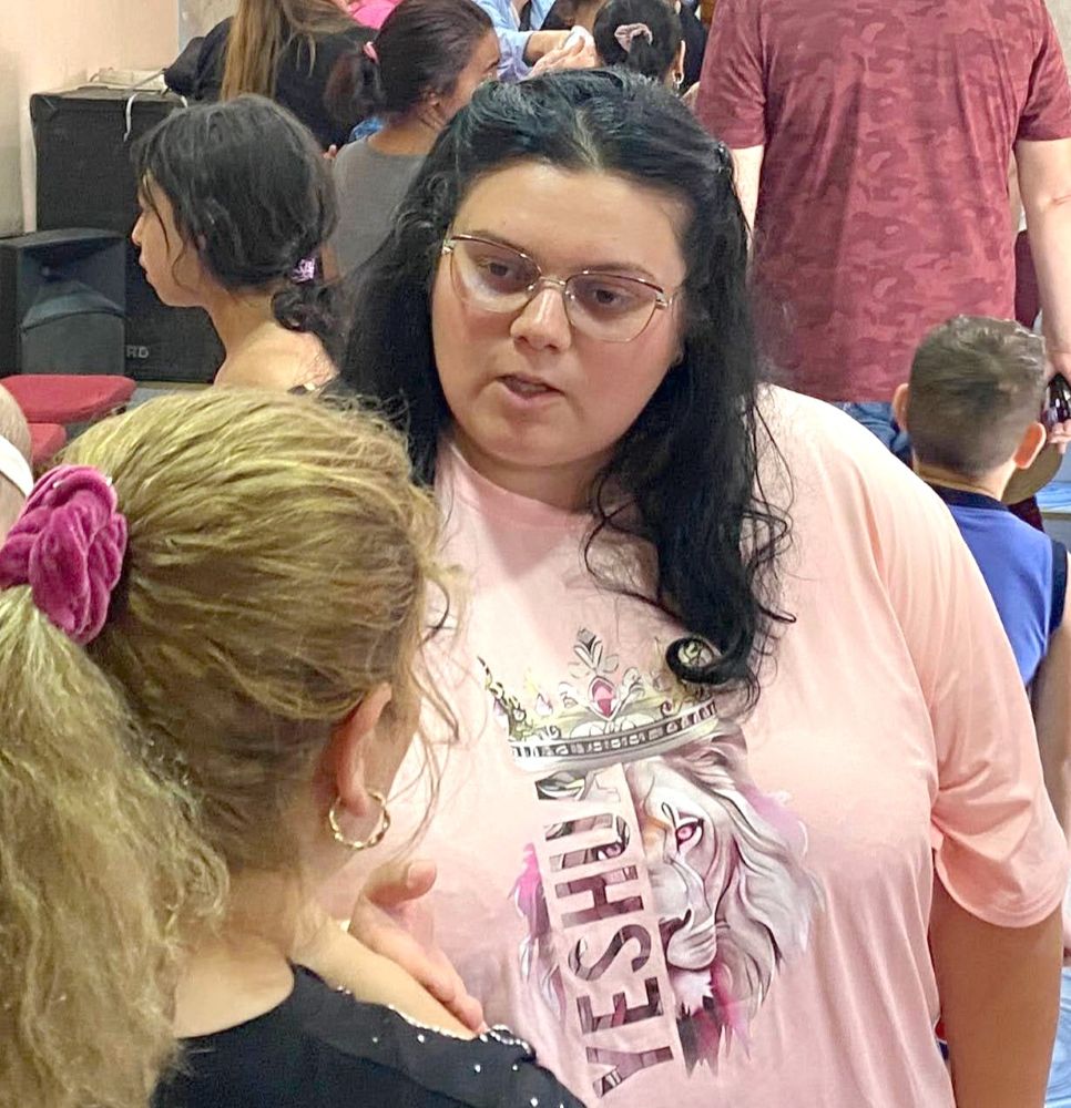 Mila talking to a mother